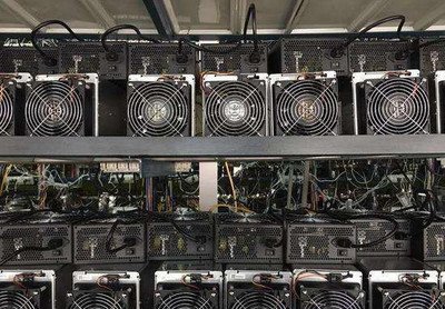 High-density mining farm interior indicative of energy and space optimization